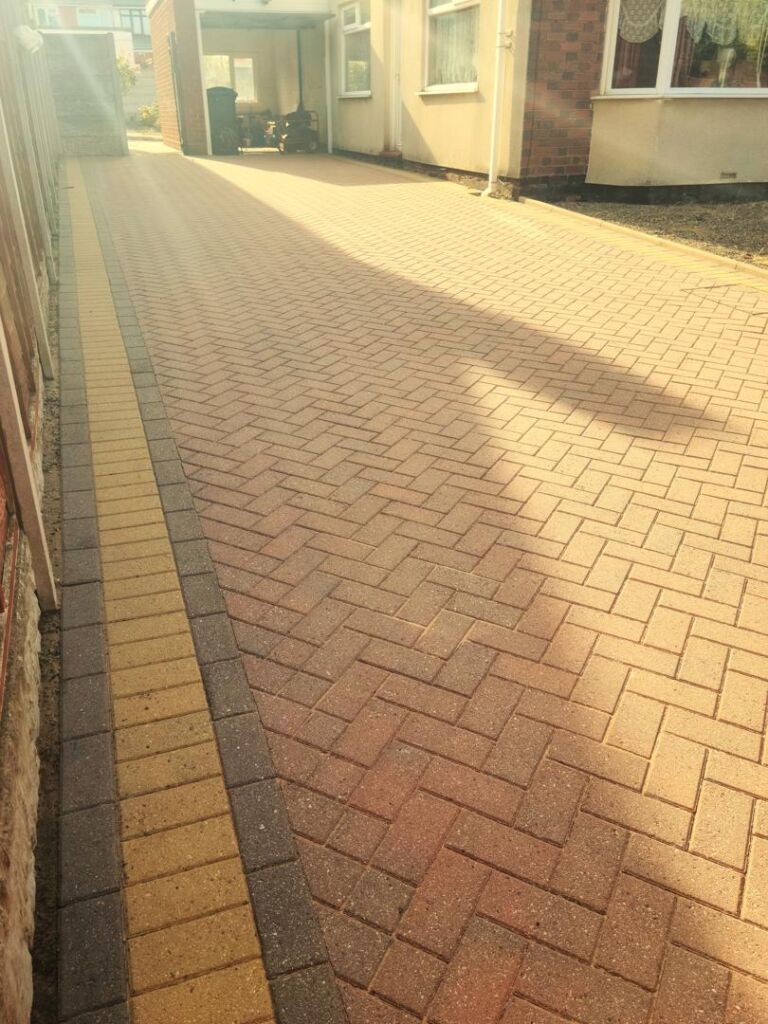photo of a block paving drive after being cleaned